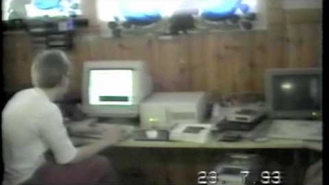 A crew member at a CRT on 23 July 1993, finishing Second Reality